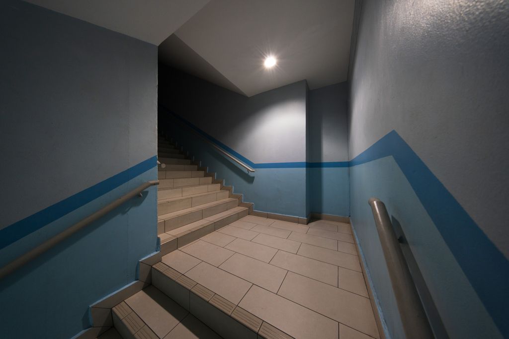 Halfway in the Stairs That Do Not Care Either Way